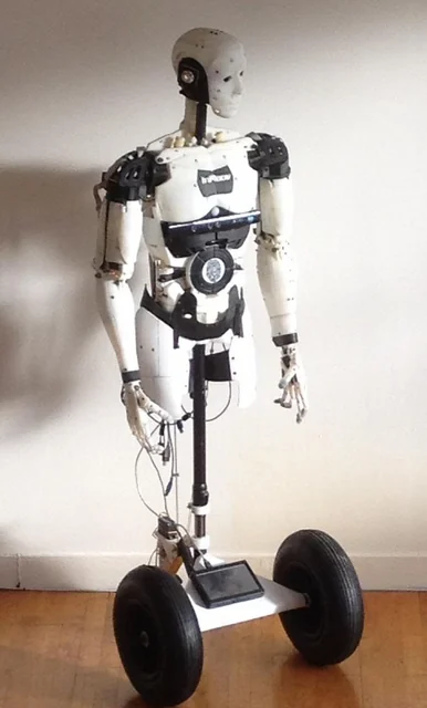 InMoov 3D-printed humanoid torso on a wheeled base